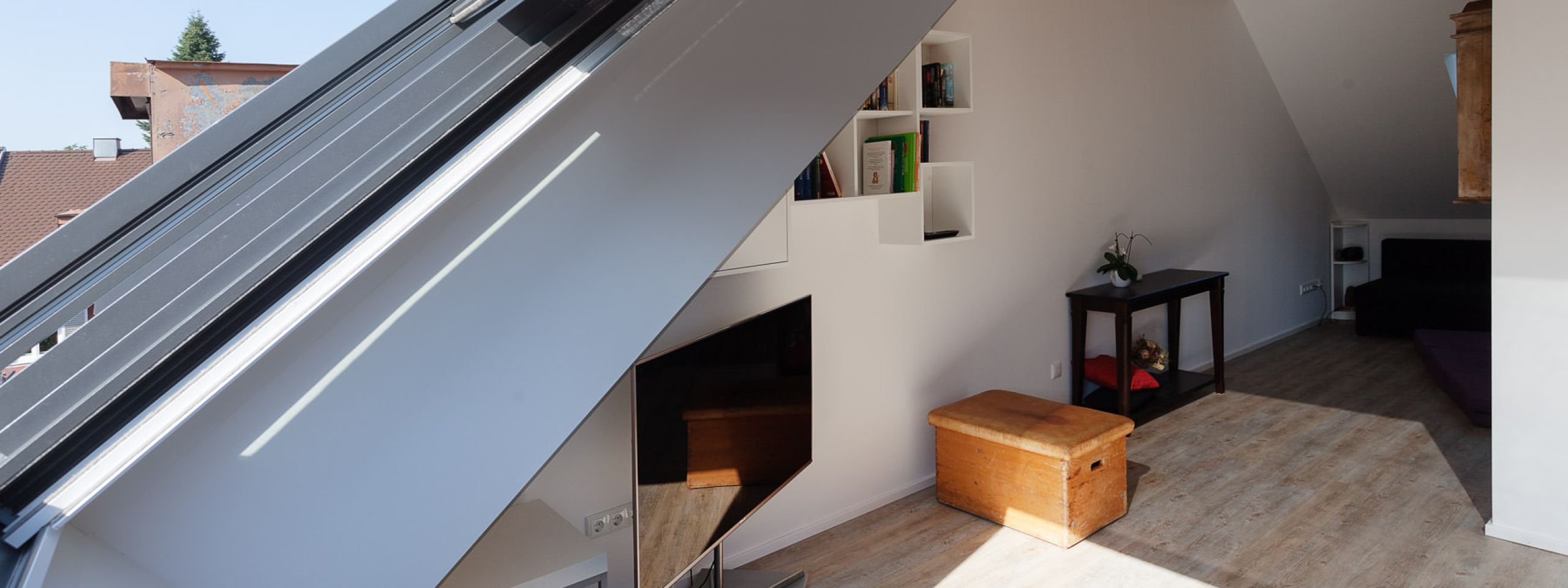 Dachgeschossumbau und energetische Sanierung eines Reihenmittelhauses